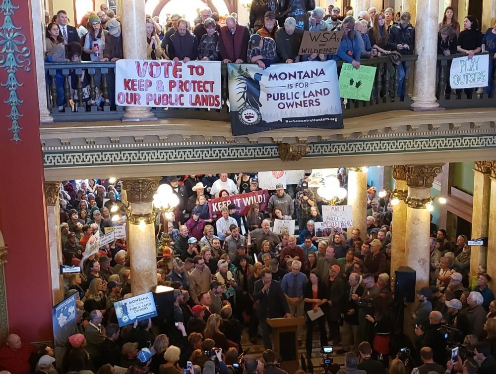 Public lands supporters rally at the state capitol rotunda in Helena, Montana. 