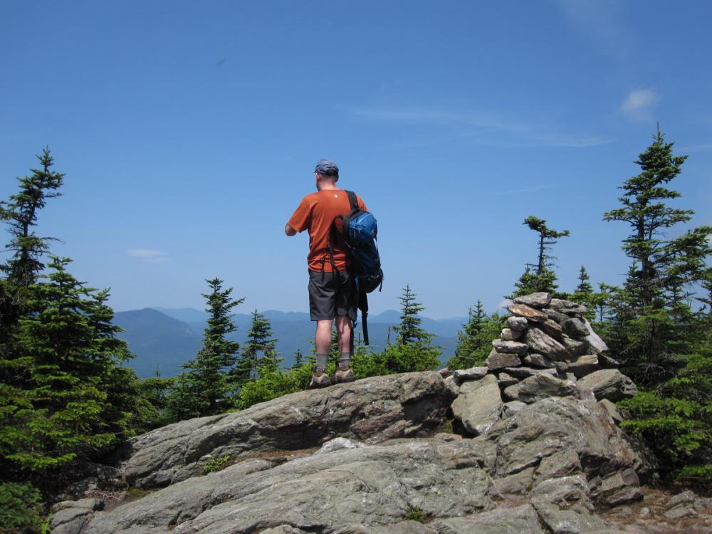 Hiker on Sandwich Mountain within the Sandwich Range Wilderness, New Hampshire