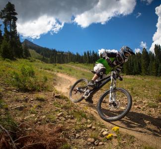 A mountain biker rides down a trail in Crusted Butte, Colorado.