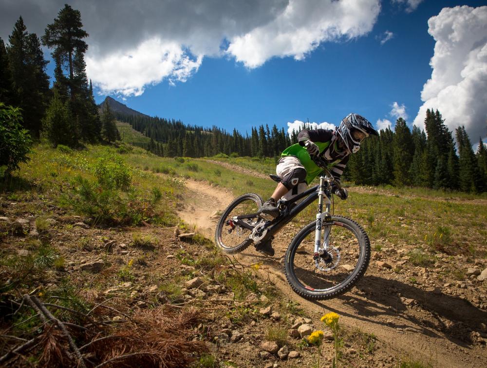 A mountain biker rides down a trail in Crusted Butte, Colorado.