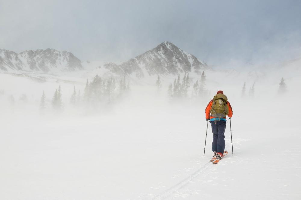 Skier in snowy landscape, White River National Forest, Colorado