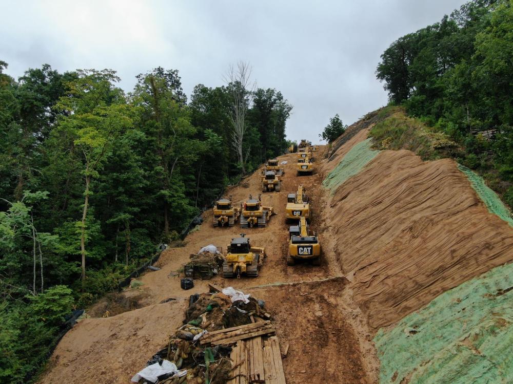 Several excavators along the pipeline route