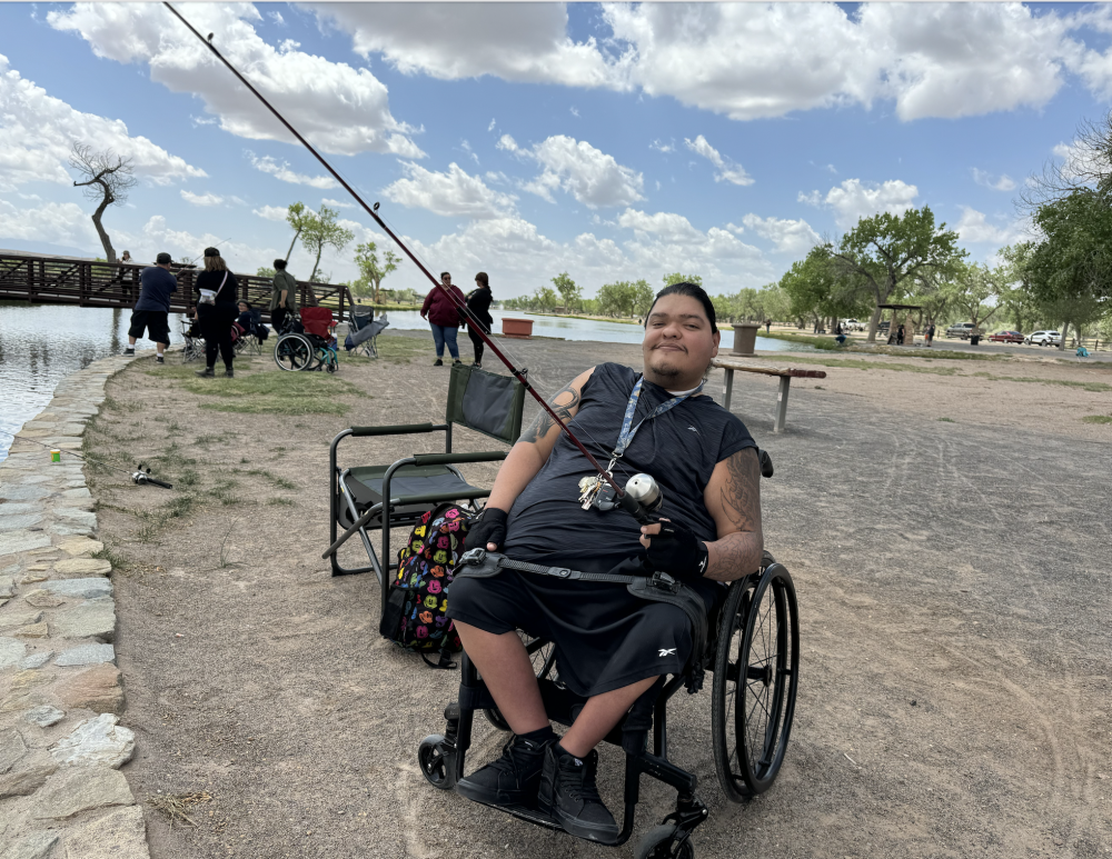 person in wheelchair, fishing