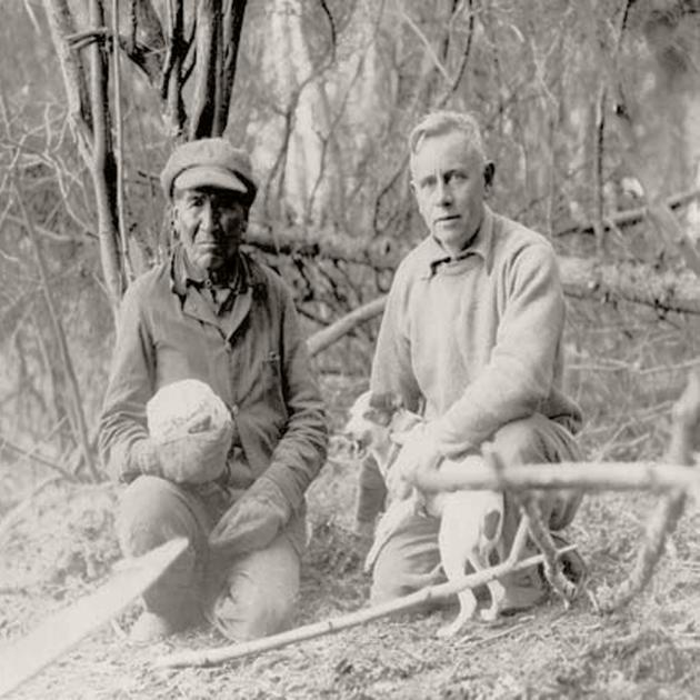 Ernest Oberholtzer (right) with dog Skippy and Tay-tah-pa-sway-wi-tong (left) holding cabbage.