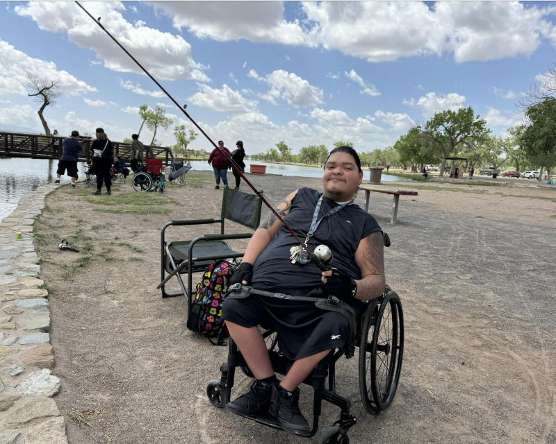 person in wheelchair, fishing